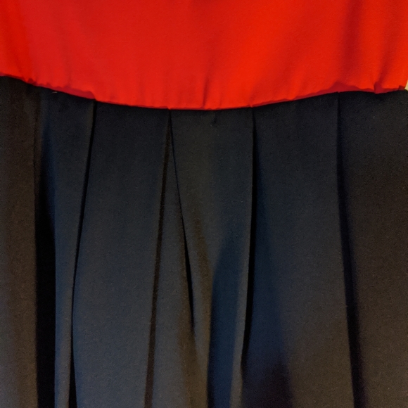 Open Back Bow dress with black mini skirt. - Picture 2 of 8